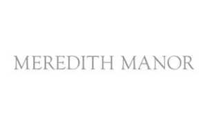 The image displays the words "Meredith Manor" in uppercase, thin gray letters on a plain white background.